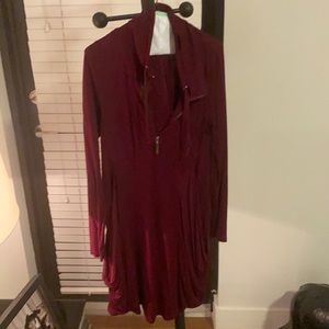 it's a nice dark red sweater very long it's very nice to go out on a cold day